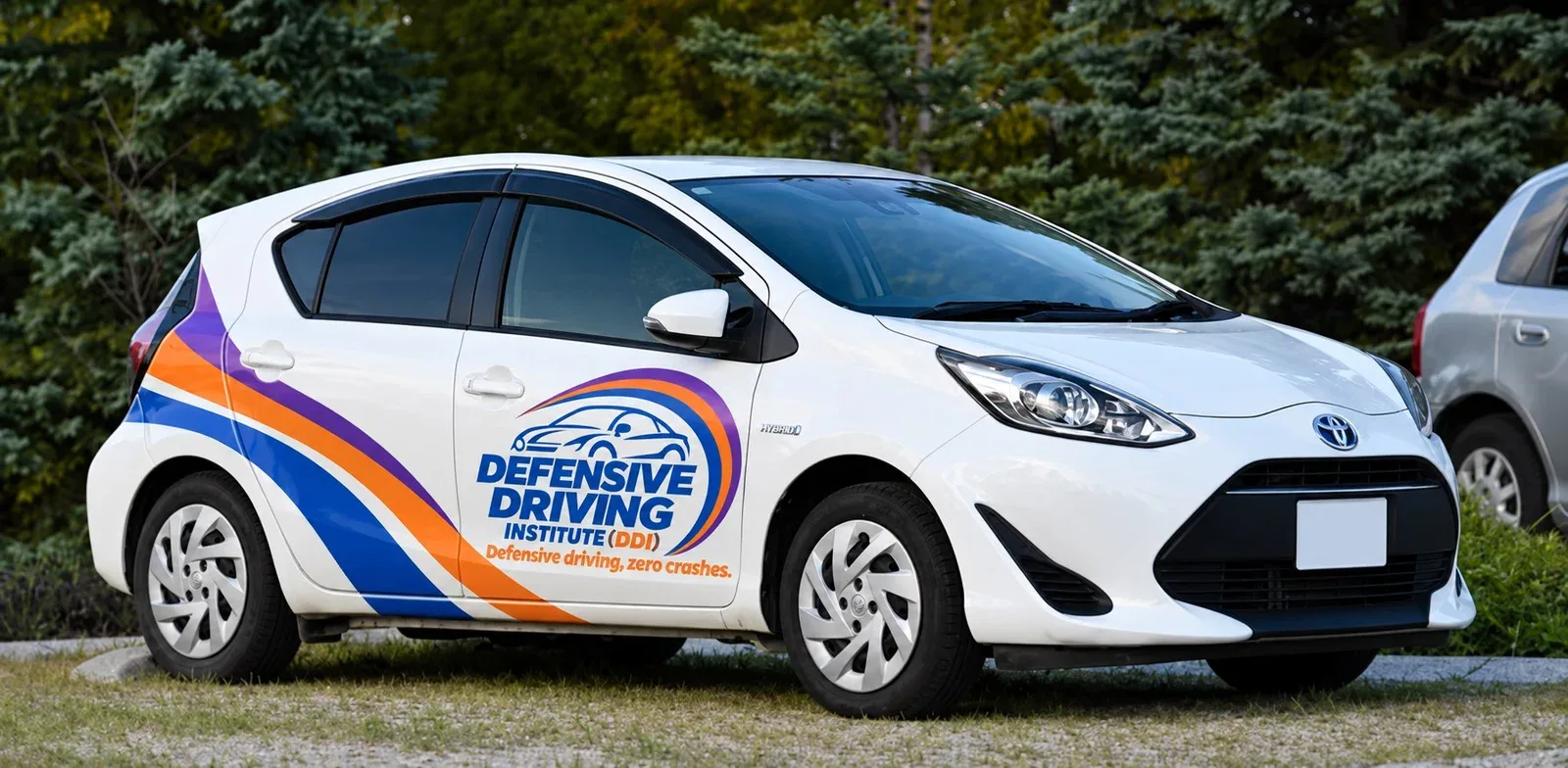 DDI branded Toyota Aqua Hybrid dual-control driving school car